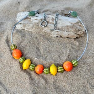 collar frutas acero artesania