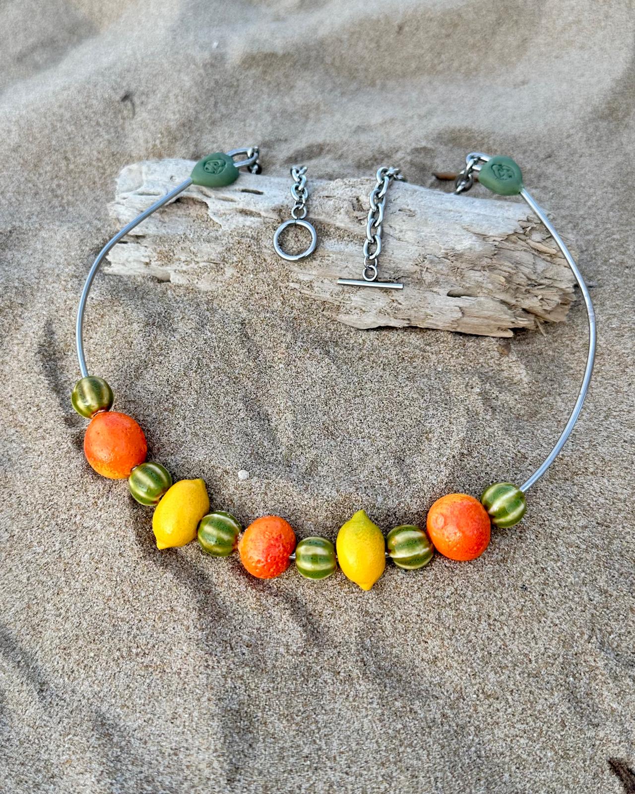 collar frutas acero artesania